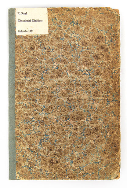 First edition of Rasmus Rask's Singalesisk Skriftlaere, the first Singalese grammar in any European language. Contains Sinhala script printed with movable type.