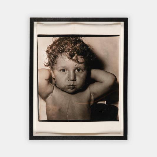 Four photographs depicting the son of Diane Arbus's close friend, Shirley Fingerhood.