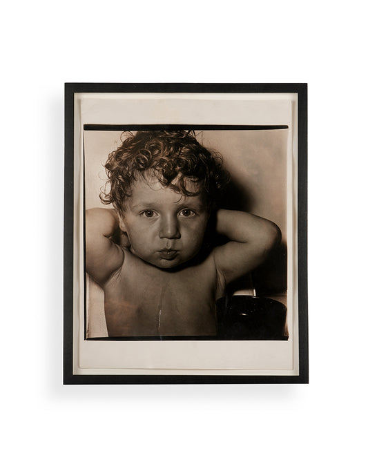 Four photographs depicting the son of Diane Arbus's close friend, Shirley Fingerhood.