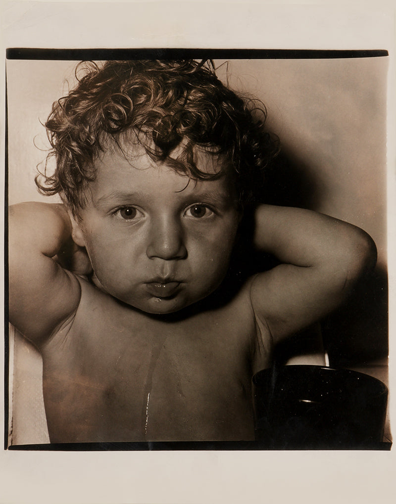 Four photographs depicting the son of Diane Arbus's close friend, Shirley Fingerhood.
