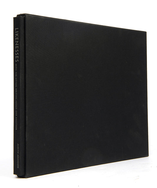 This signed, special first edition of Aronson's photobook, featuring famous cultural figures, includes an insert with a photograph unique to this edition.