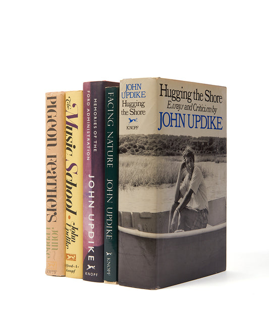 Superb set of first editions by John Updike, each inscribed by the author to his former student, Nicholas Delbanco.