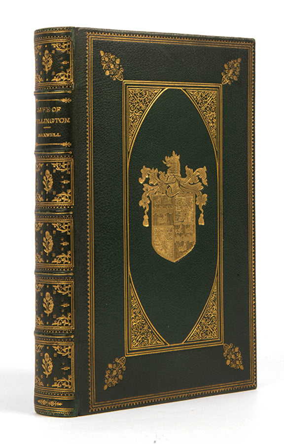 A inely bound example of Maxwell's Life of Wellington, bound in green morocco for The Judd School by Bickers