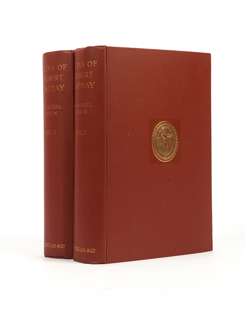 First edition of Aurel Stein's Ruins of Desert Cathay, in the  rare original publisher's dust-jackets, printed on cream paper in black with photograph to front panels not found in the text, leaving the books in truly fine condition.