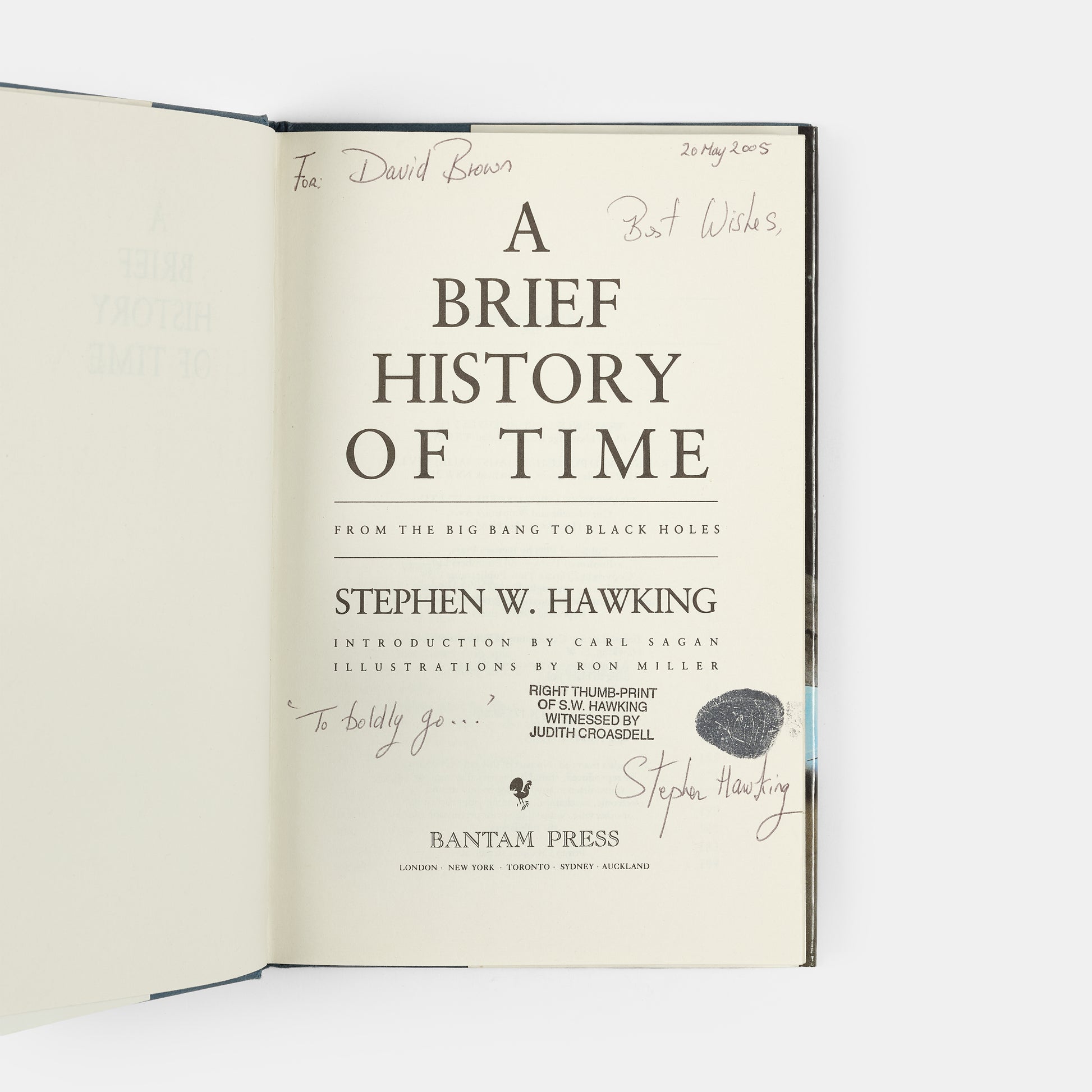 Thumbprint-signed copy of the eighth printing of Stephen Hawking's A Brief History of Time, presented to the former porter at Gonville & Caius College, Cambridge.