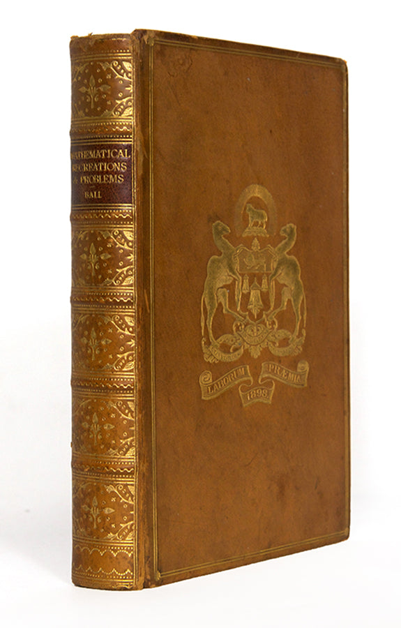 A handsomely bound copy of Mathematical Recreations by W.W. Rouse Ball, in gilt tree calf for the Merchant Taylor's School.