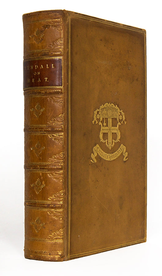 A finely bound copy of Heat: A Mode of Motion by physicist John Tyndall, the sixth edition published in 1880 and presented as a prize by Christ's Hospital, London.