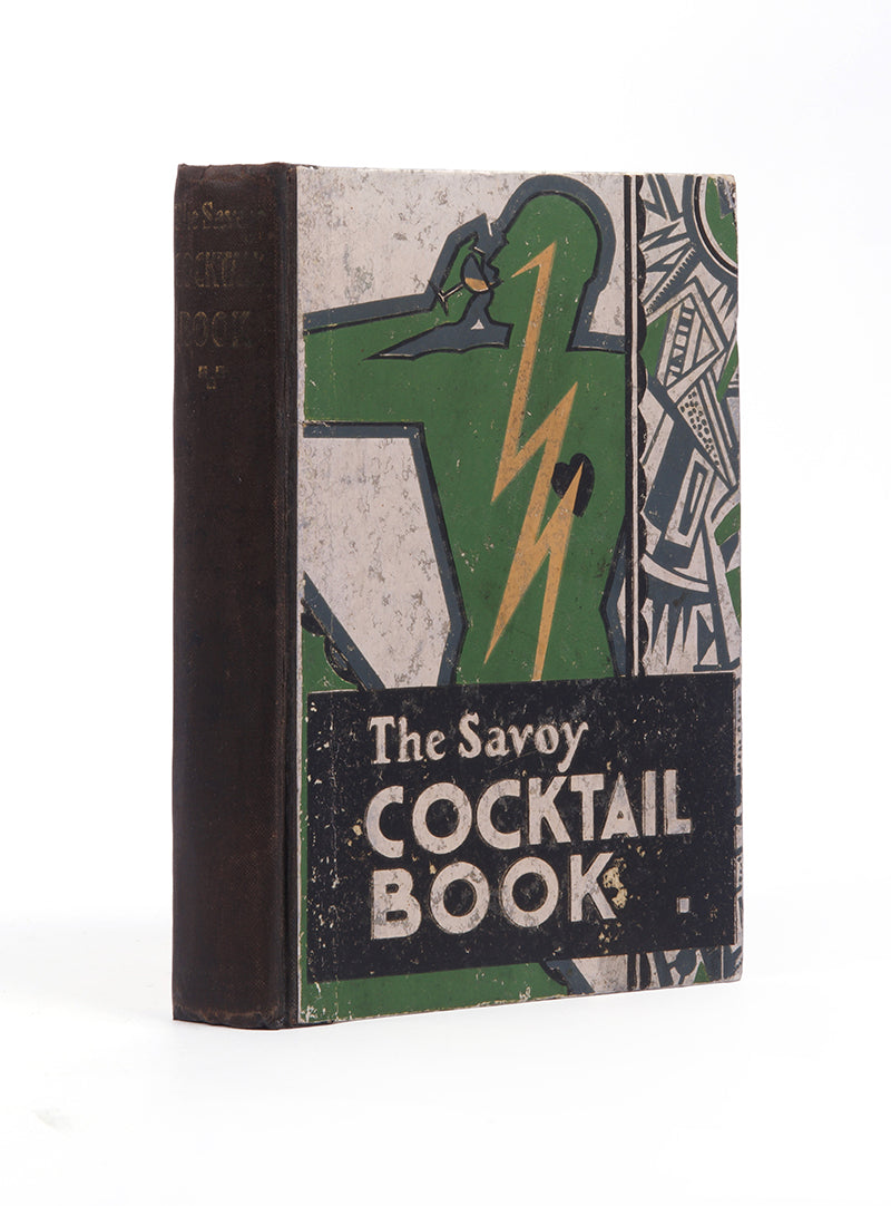A very good copy of the first impression of The Savoy Cocktail Book by Harry Cradock, an Art Deco classic.