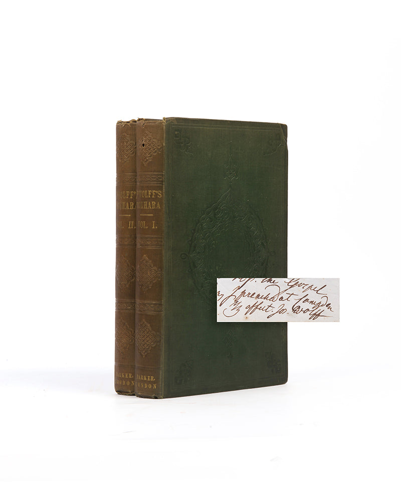 The rare first edition of Joseph Wolff's Narrative of a Mission to Bokhara, with a tipped in signature to pastdown.