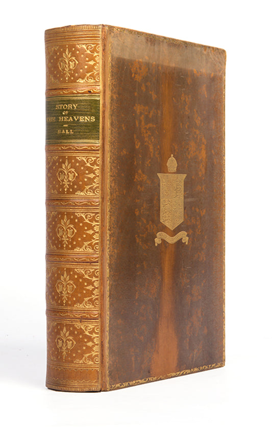 A handsomely bound copy of The Story of the Heavens by Robert S. Ball, published in 1910 and awarded as a prize by the Shrewsbury School.