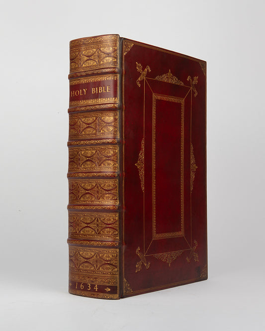 A rare complete example of the fourth distinct folio edition of the King James Bible, beautifully bound in red morocco gilt