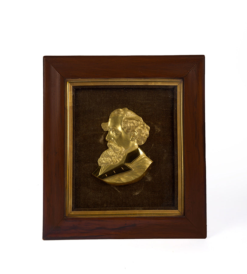 Head and shoulders gilt bronze relief bronze relief of Charles Dickens in profile, in a fine state of mounted on contemporary dark brown silver velvet.