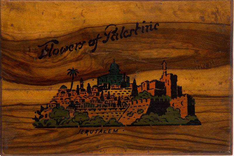 Early 20th-century souvenirs from Jerusalem, containing local dried flowers and colour-lithograthed views of the Holy Land.