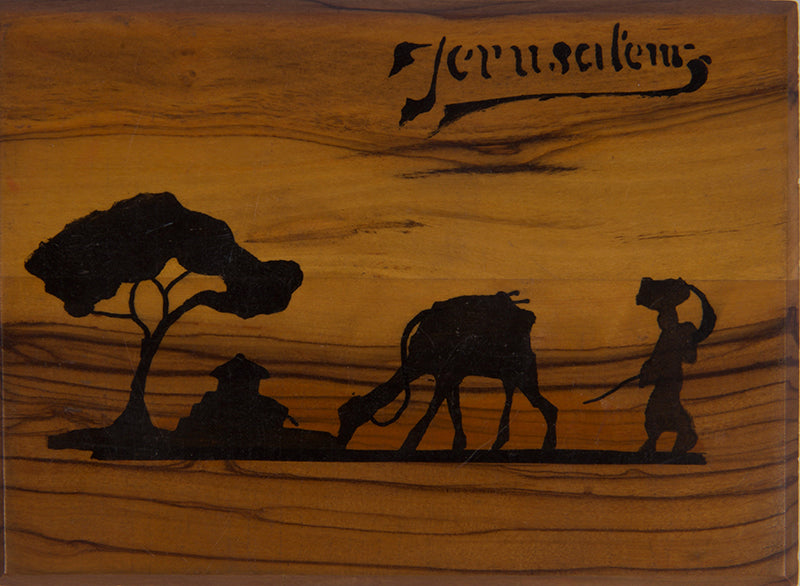 Early 20th-century souvenirs from Jerusalem, containing local dried flowers and colour-lithograthed views of the Holy Land.