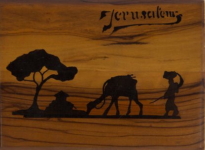 Early 20th-century souvenirs from Jerusalem, containing local dried flowers and colour-lithograthed views of the Holy Land.