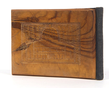 Early 20th-century souvenirs from Jerusalem, containing local dried flowers and colour-lithograthed views of the Holy Land.