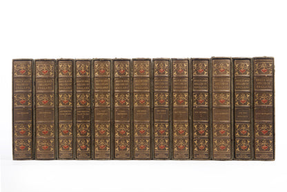 This 13 volume, limited edition,  biographical set is stunningly bound with enamel inlay, florid decoration and green silk endpapers, and gilt decoration