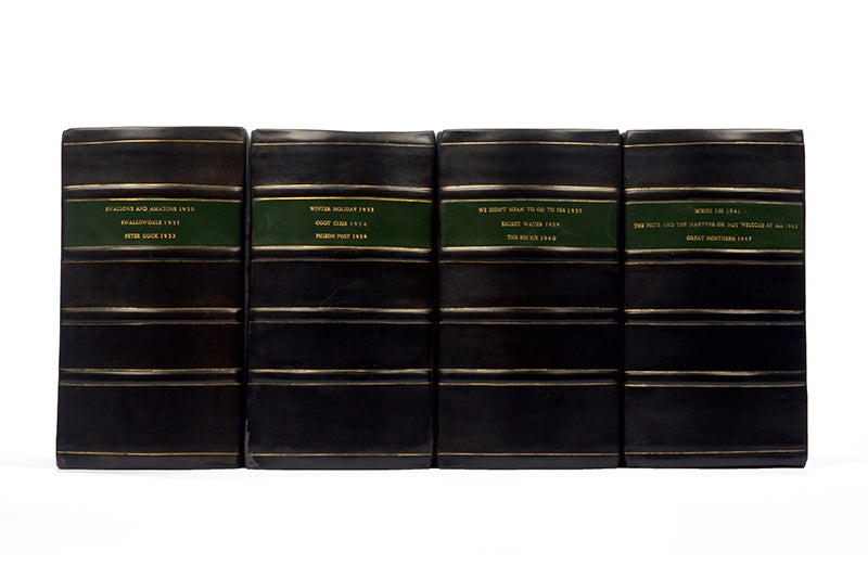 Rare to find complete first edition, first impression set of Swallows and Amazons, with the original dust wrappers, housed in custom made, velvet lined, clamshell boxes 
