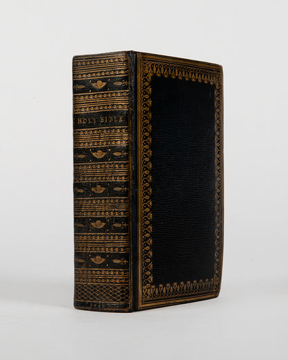 A fine King James pocket Bible pritned the year of the Restoration of King Charles II in 1660 and extra-illustrated with 140 engraved plates