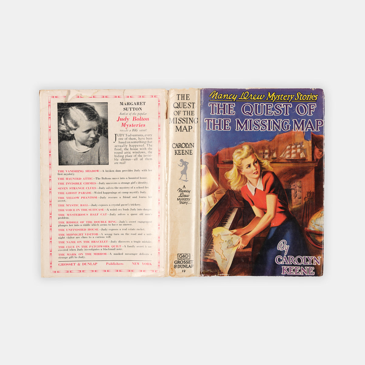 A first edition of The Quest of the Missing Map by Carolyn Keene, the nineteenth book in the Nancy Drew series.