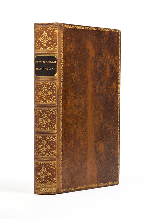 A handsome copy in contemporary tree calf gilt of Dobson's abrudged edition of Napier's history of the Peninsular War