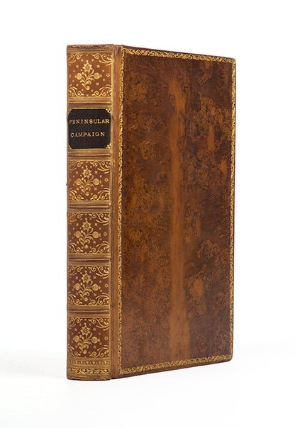 A handsome copy in contemporary tree calf gilt of Dobson's abrudged edition of Napier's history of the Peninsular War