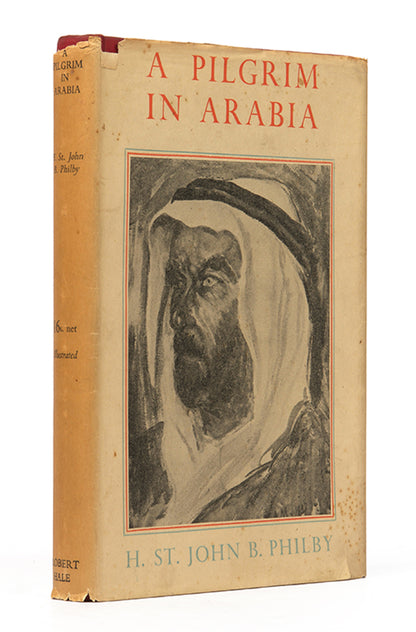 First trade edition of A Pilgrim in Arabia by Harry St John Philby, the account of Philby's Hajj in 1930, in the scarce dust-jacket.