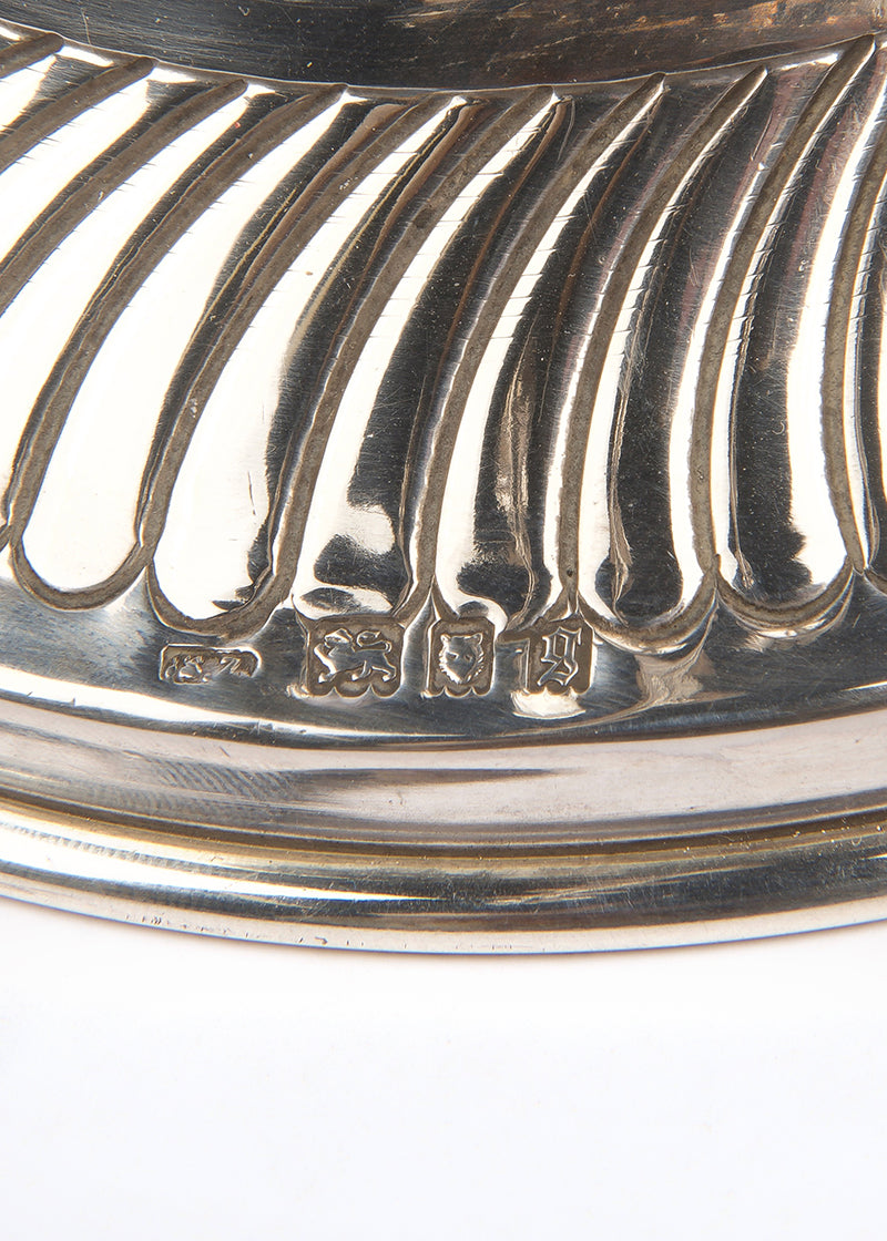 A magnificent example of a fine, early-20th-century British, silver Hanukkah lamp with a detachable Shamash by Sigmund Zyto.