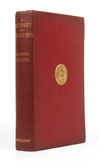 A diversity of creatures by Rudyard Kipling first edition in red cloth hardback with the original dust jacket a collection of prose intermingled with verse