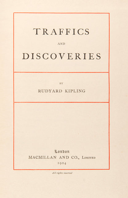 First edition copy of Rudyard Kipling's Traffics and Discoveries a collection of short stories in the publisher's original red cloth with a gilt-blocked medallion to upper panel