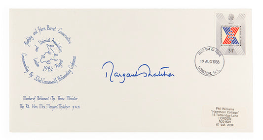 two items of ephemera, a pamphlet and envelope, signed by margaret thatcher towards the latter half of her career as prime minister
