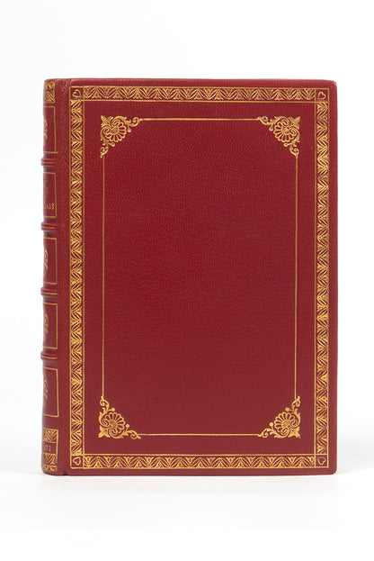 A handsomely bound edition of Through the looking glass, by Lewis Carroll, in red leather and gilt, First edition, second issue, 1872, thirteenth thousand