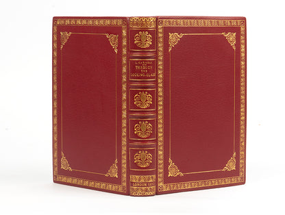 A handsomely bound edition of Through the looking glass, by Lewis Carroll, in red leather and gilt, First edition, second issue, 1872, thirteenth thousand