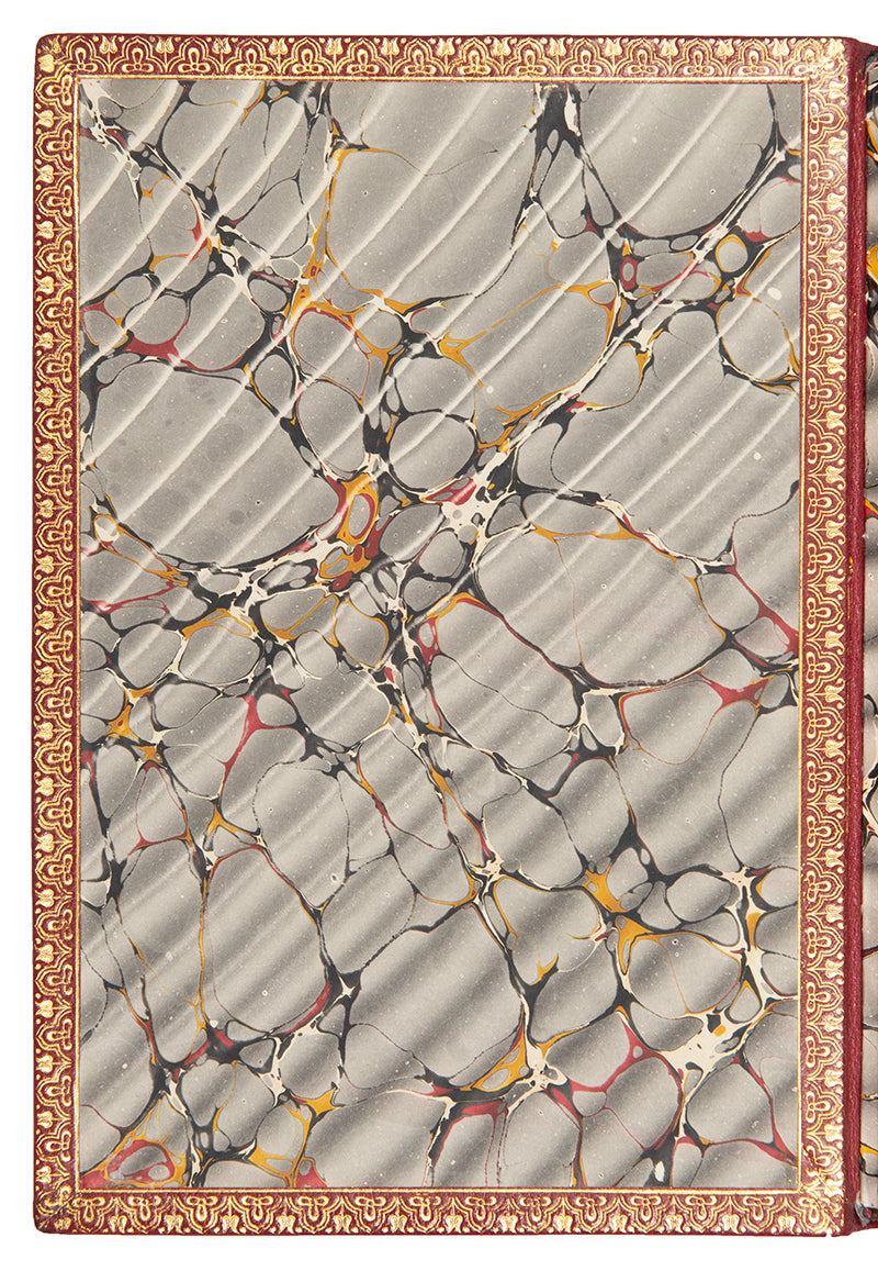 A handsomely bound edition of Through the looking glass, by Lewis Carroll, in red leather and gilt, First edition, second issue, 1872, thirteenth thousand