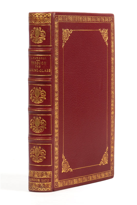 A handsomely bound edition of Through the looking glass, by Lewis Carroll, in red leather and gilt, First edition, second issue, 1872, thirteenth thousand