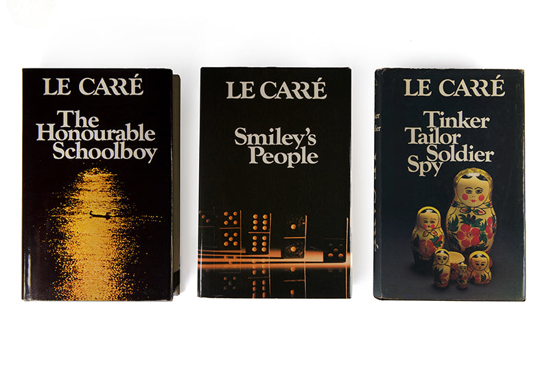 A superior set of the trilogy, Tinker Tailor, Honorable School boy and Smiley's People, by John Le Carré, housed in a custom made slip case, all first printings