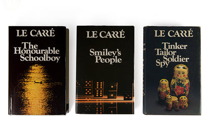 A superior set of the trilogy, Tinker Tailor, Honorable School boy and Smiley's People, by John Le Carré, housed in a custom made slip case, all first printings