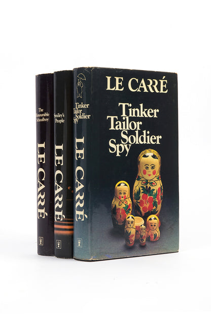 A superior set of the trilogy, Tinker Tailor, Honorable School boy and Smiley's People, by John Le Carré, housed in a custom made slip case, all first printings