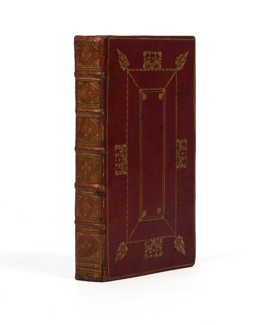 A scarce octavo edition of Richard Allestree's Whole Duty of Man, bound in gilt-panelled red morocco