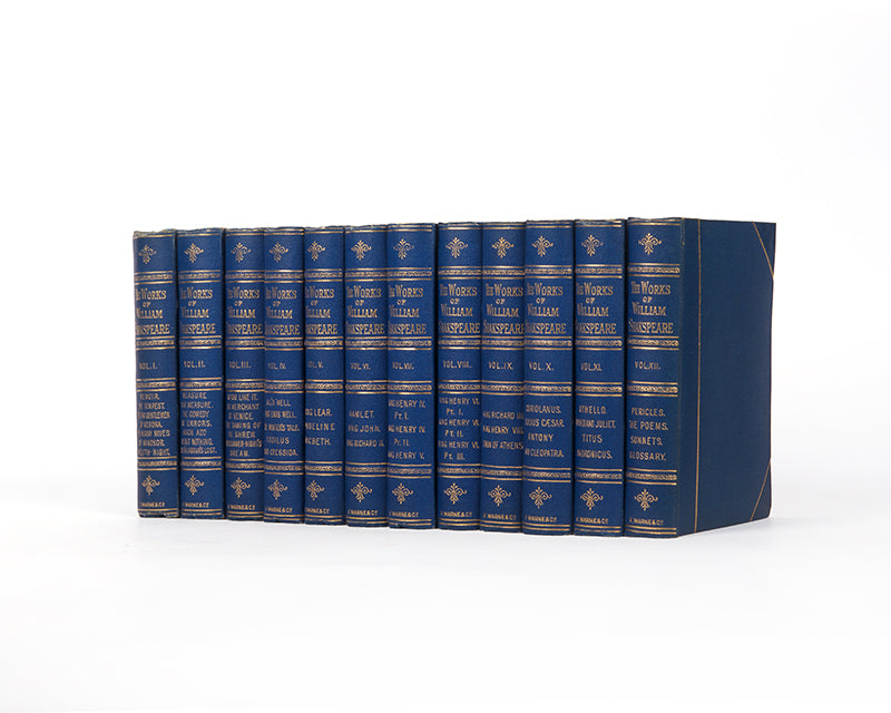 A charming pocket book set of Shakespeare's complete works, housed in the original glazed wooden cabinet.