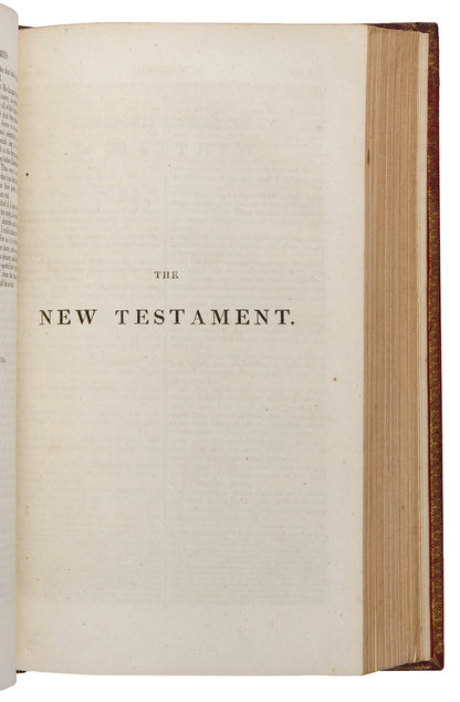 An excellent example of this family Bible bound contemporary red morocco tooled with a gilt strapwork design