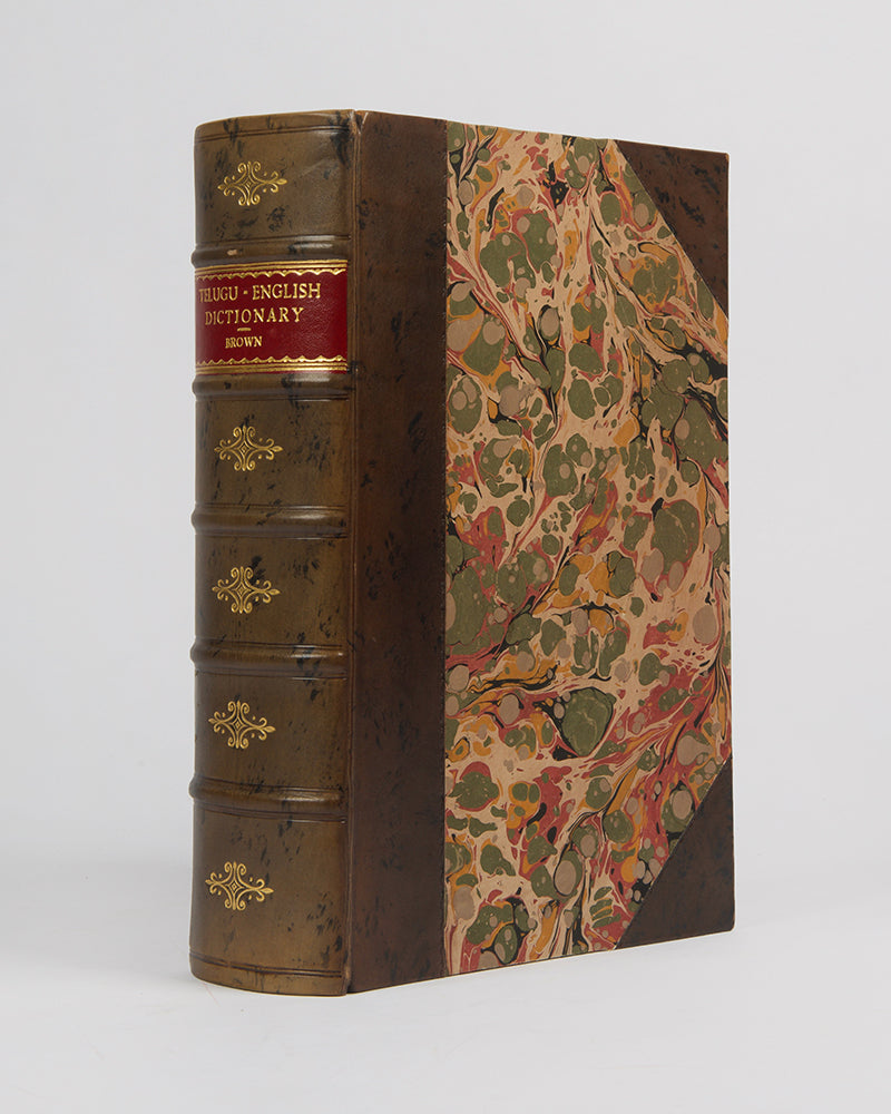 First editions of Charles Brown's A Dictionary, Telugu and English, and A Dictionary of the Mixed Dialects and Foreign Words used in Telugu, the most comprehensive dictionary of Telugu of its time.
