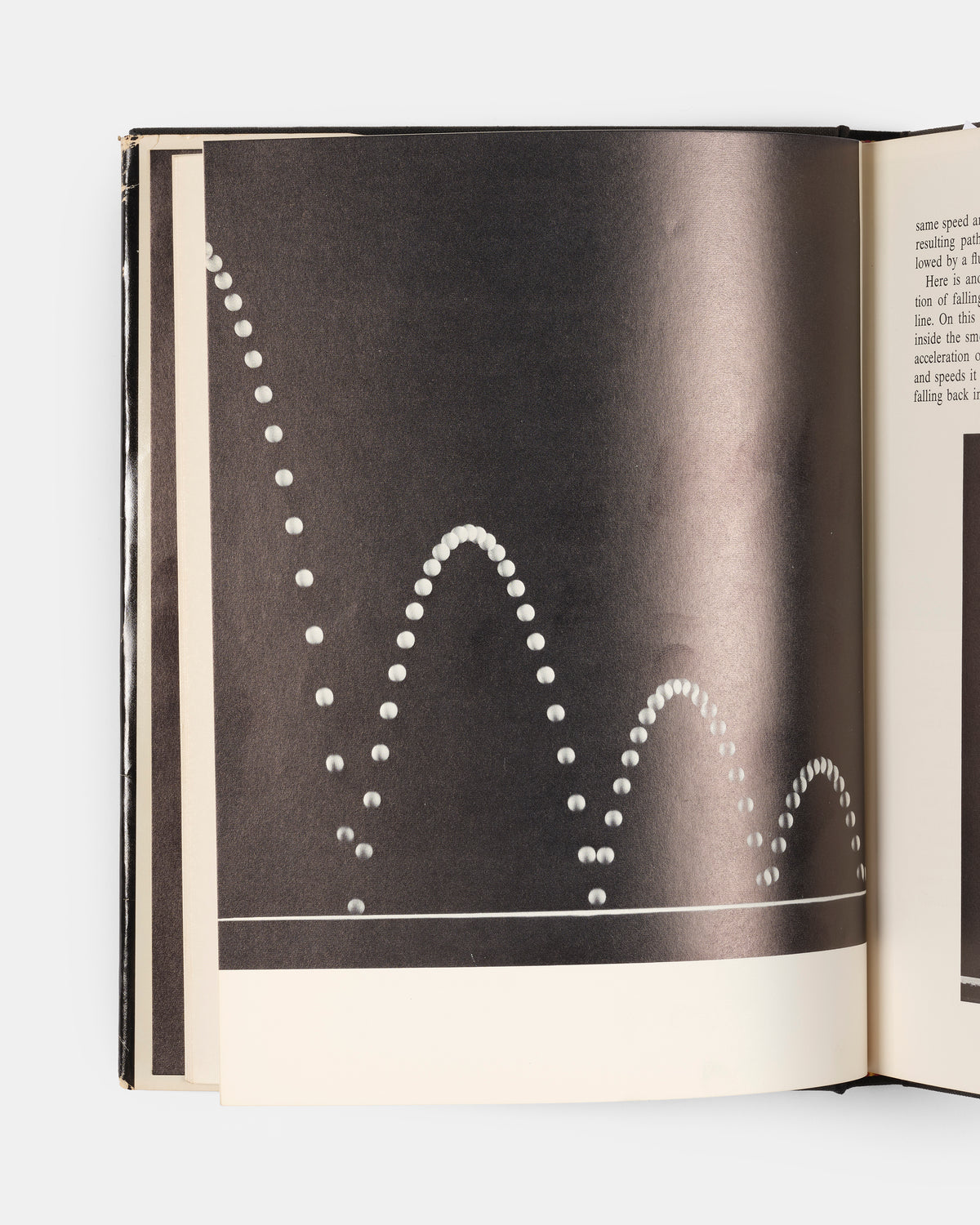 First edition of The Attractive Universe by E.G Valens, a delightful introductory work on gravity with superb illustrations by modernsit photographer Berenice Abbott.