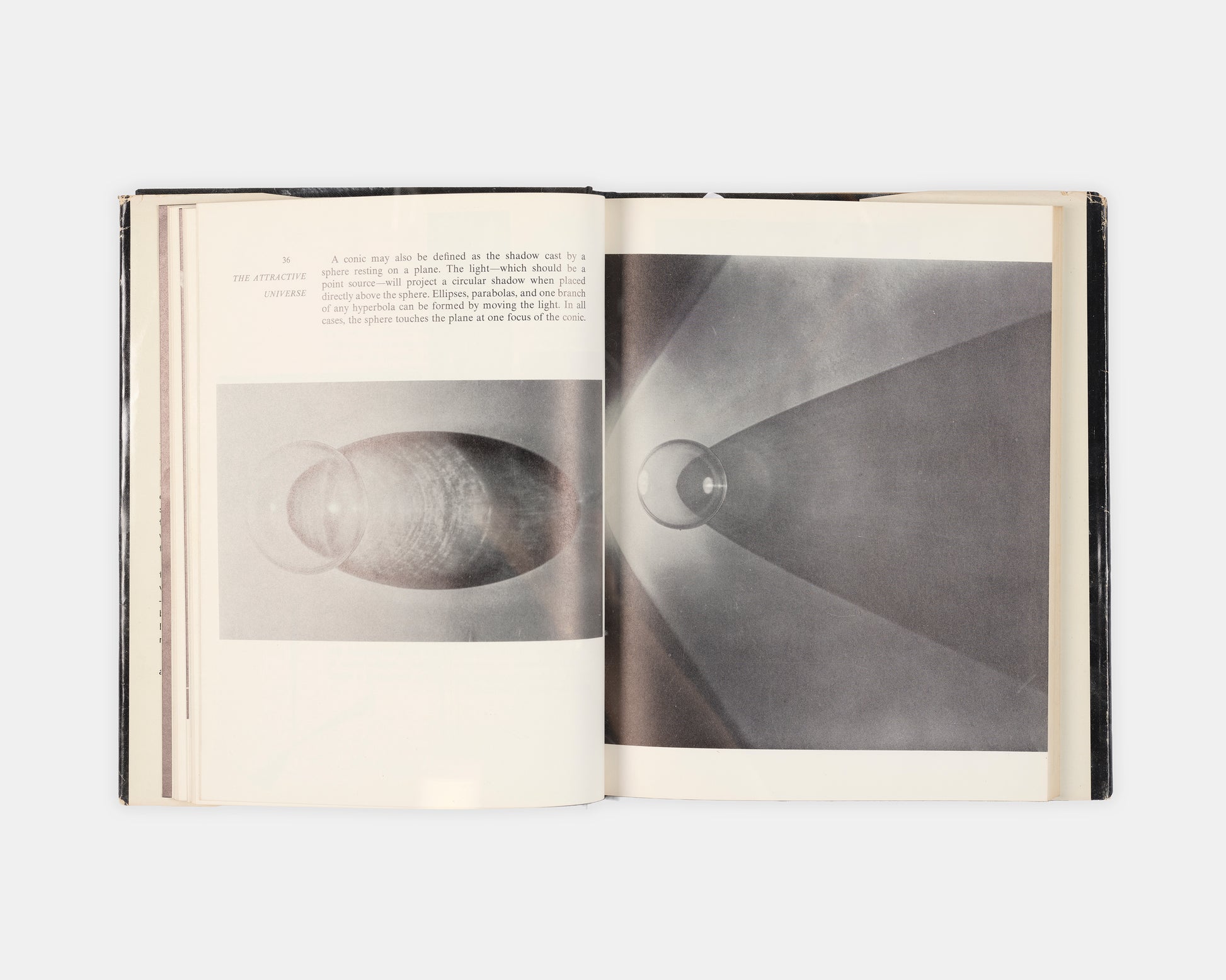 First edition of The Attractive Universe by E.G Valens, a delightful introductory work on gravity with superb illustrations by modernsit photographer Berenice Abbott.