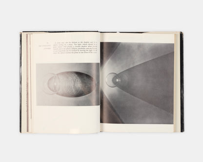 First edition of The Attractive Universe by E.G Valens, a delightful introductory work on gravity with superb illustrations by modernsit photographer Berenice Abbott.