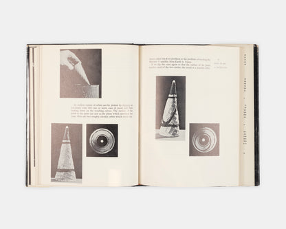 First edition of The Attractive Universe by E.G Valens, a delightful introductory work on gravity with superb illustrations by modernsit photographer Berenice Abbott.