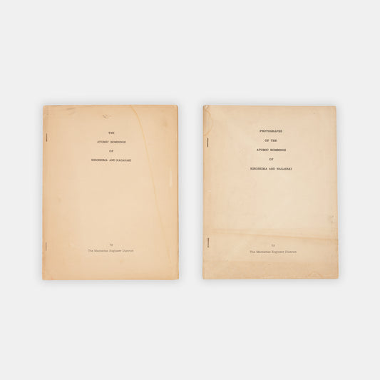 First edition, the complete set with both text and photo volumes, of this important, early scientific report on the atomic bombings of Hiroshima and Nagasaki by representatives f the Manhattan Project.