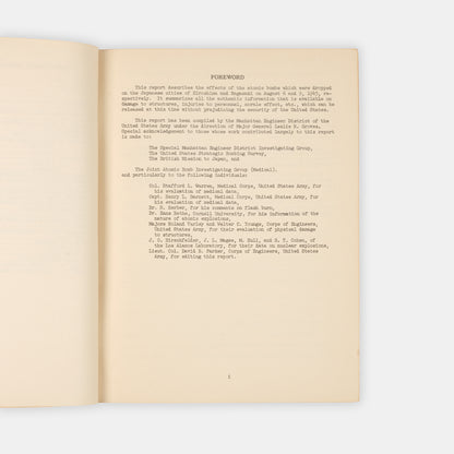 First edition, the complete set with both text and photo volumes, of this important, early scientific report on the atomic bombings of Hiroshima and Nagasaki by representatives f the Manhattan Project.
