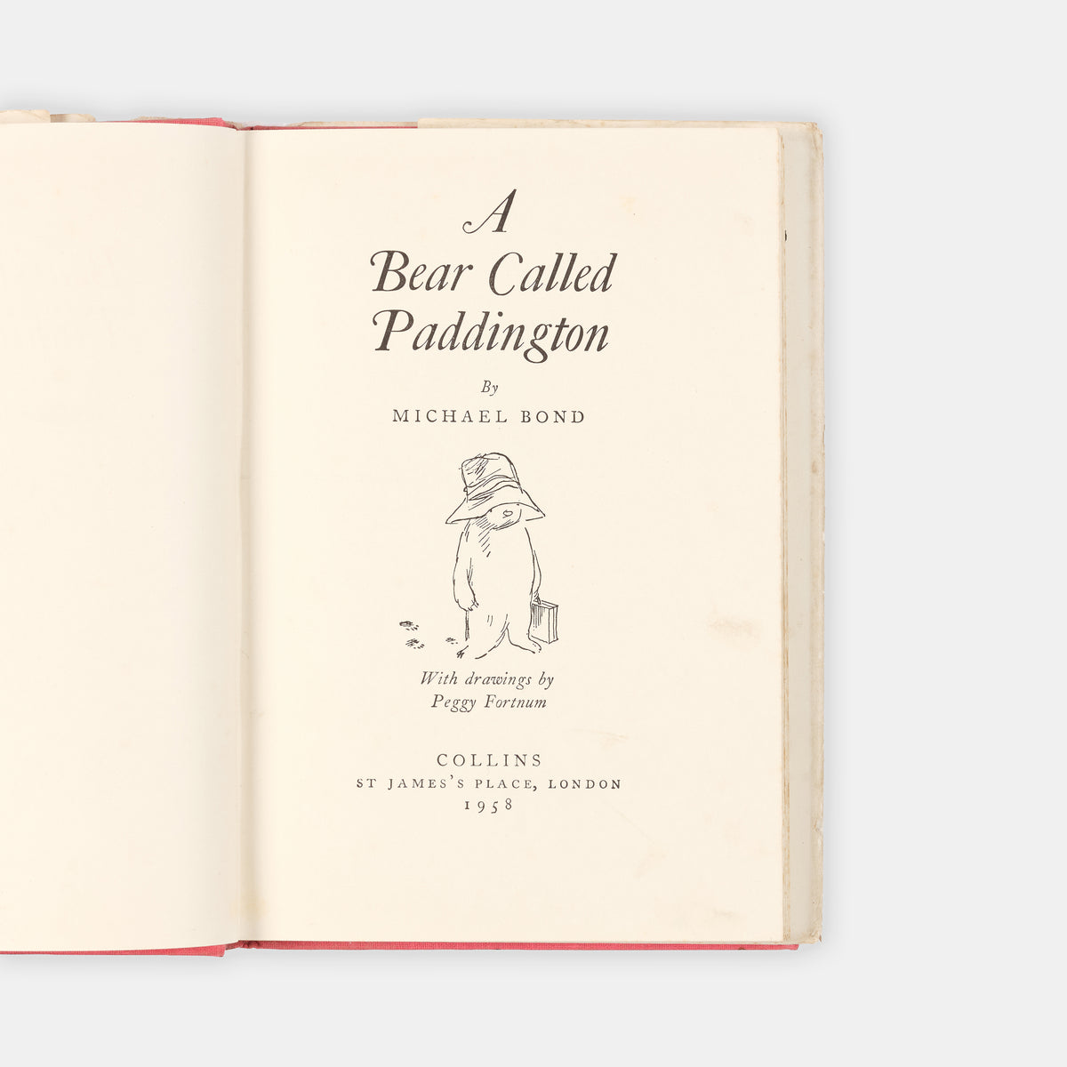 The debut of Paddington Bear a certain bear from Peru with a penchant for marmalade sandwiches, by Michael Bond; a very good first edition in the dust-jacket