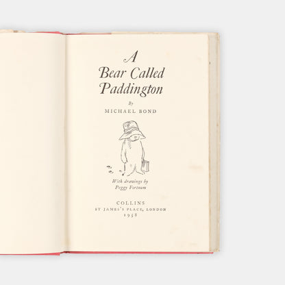 The debut of Paddington Bear a certain bear from Peru with a penchant for marmalade sandwiches, by Michael Bond; a very good first edition in the dust-jacket